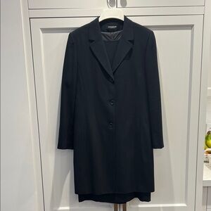 Navy women’s sleeveless dress and jacket